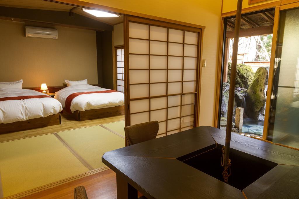 Yufuin Ryokuyu Hotel Bagian luar foto