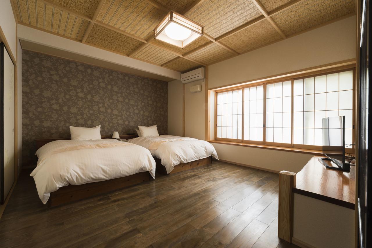 Yufuin Ryokuyu Hotel Bagian luar foto